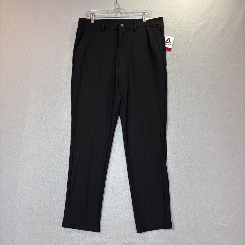 Reebok Men's Tapered Fit Stretch Pants 34W X 32L Ebony Nylon Blend NWT Golf Tech